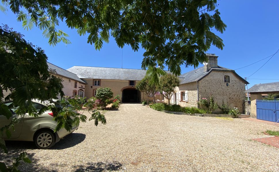 An Attractive Courtyard Farmhouse with Guest Cottage, Swimming Pool and Mountain Views