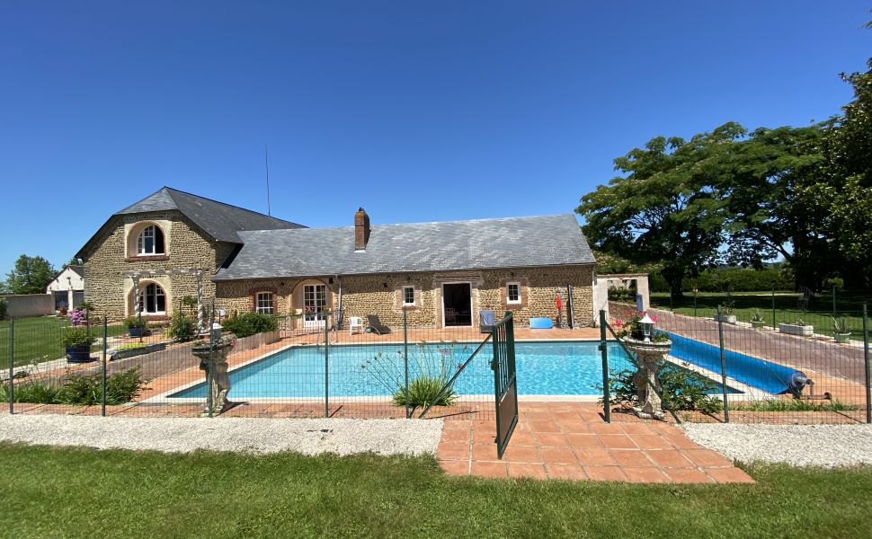An Attractive Courtyard Farmhouse with Guest Cottage, Swimming Pool and Mountain Views