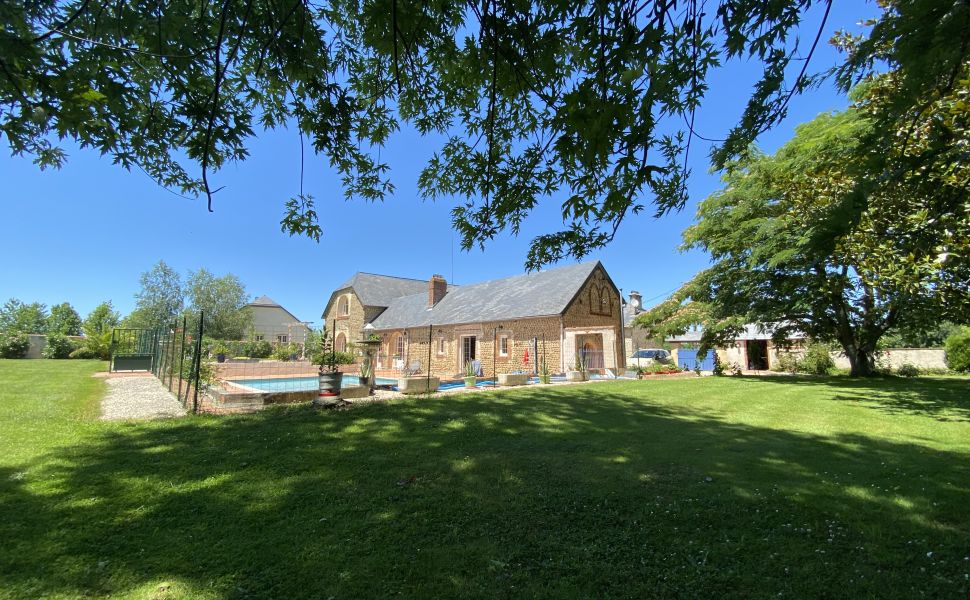 An Attractive Courtyard Farmhouse with Guest Cottage, Swimming Pool and Mountain Views