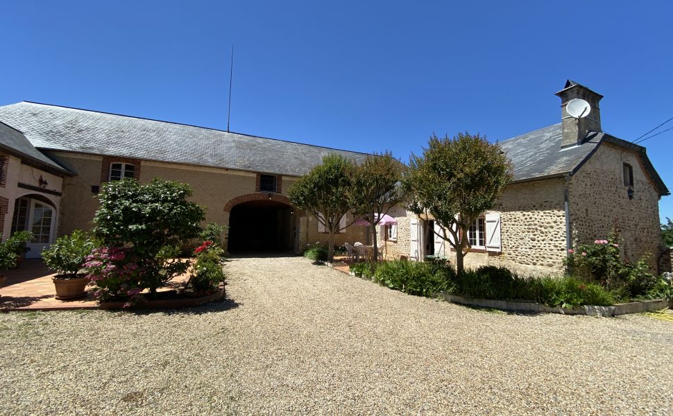 An Attractive Courtyard Farmhouse with Guest Cottage, Swimming Pool and Mountain Views