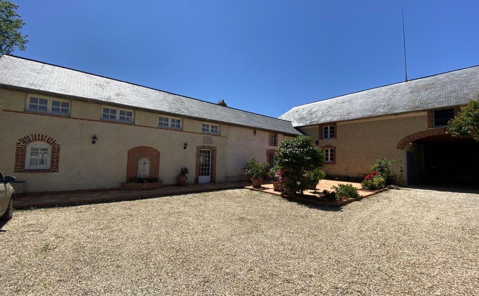 An Attractive Courtyard Farmhouse with Guest Cottage, Swimming Pool and Mountain Views