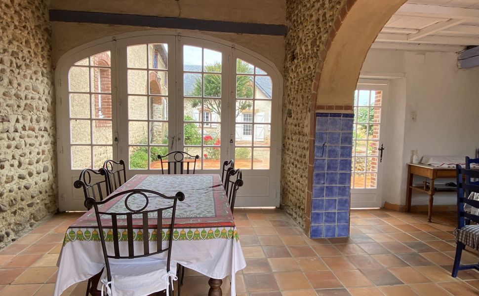 An Attractive Courtyard Farmhouse with Guest Cottage, Swimming Pool and Mountain Views