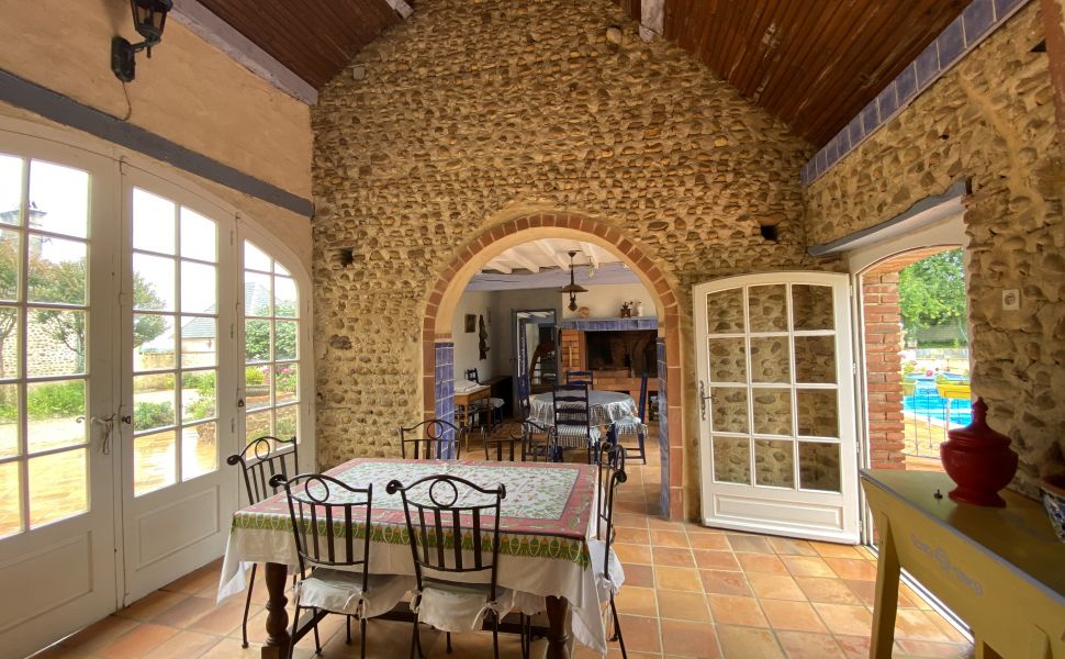 An Attractive Courtyard Farmhouse with Guest Cottage, Swimming Pool and Mountain Views