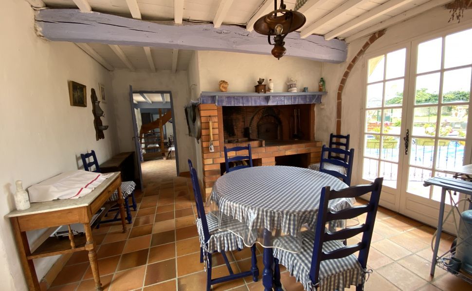 An Attractive Courtyard Farmhouse with Guest Cottage, Swimming Pool and Mountain Views
