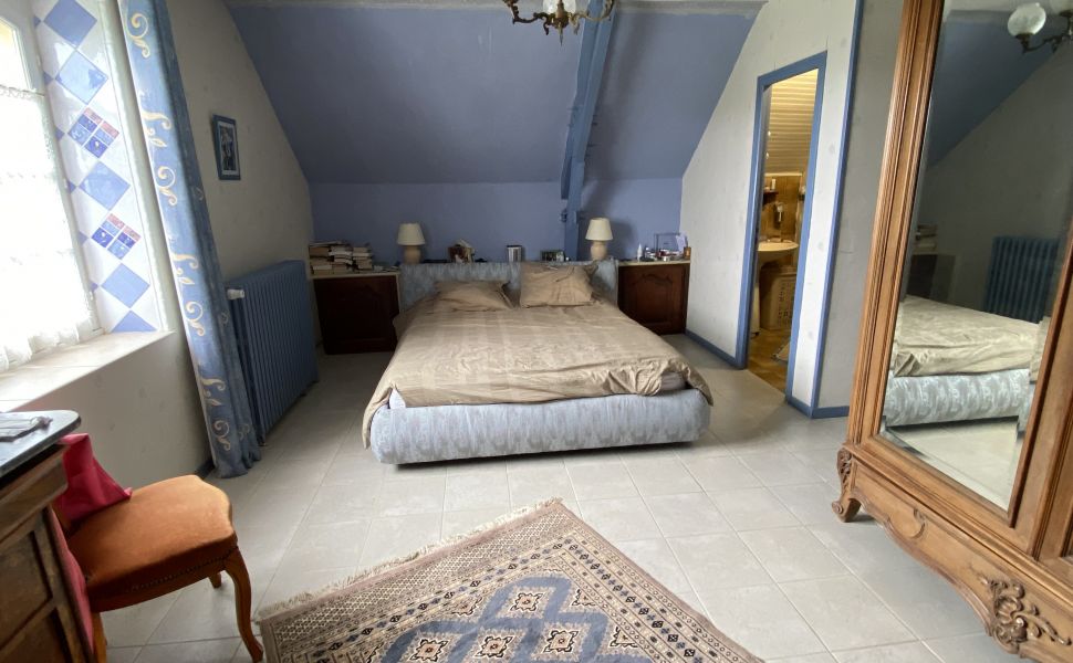 An Attractive Courtyard Farmhouse with Guest Cottage, Swimming Pool and Mountain Views