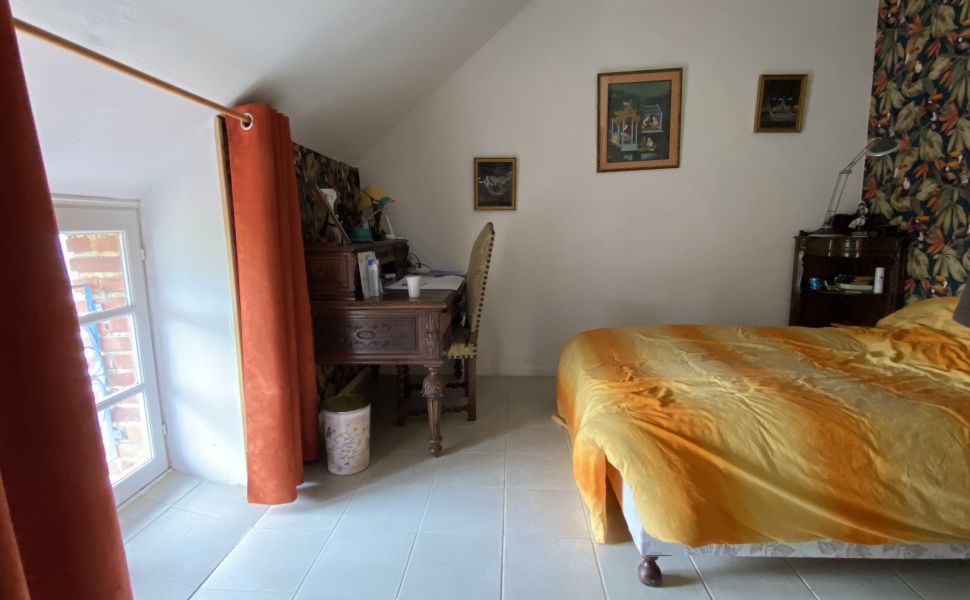 An Attractive Courtyard Farmhouse with Guest Cottage, Swimming Pool and Mountain Views
