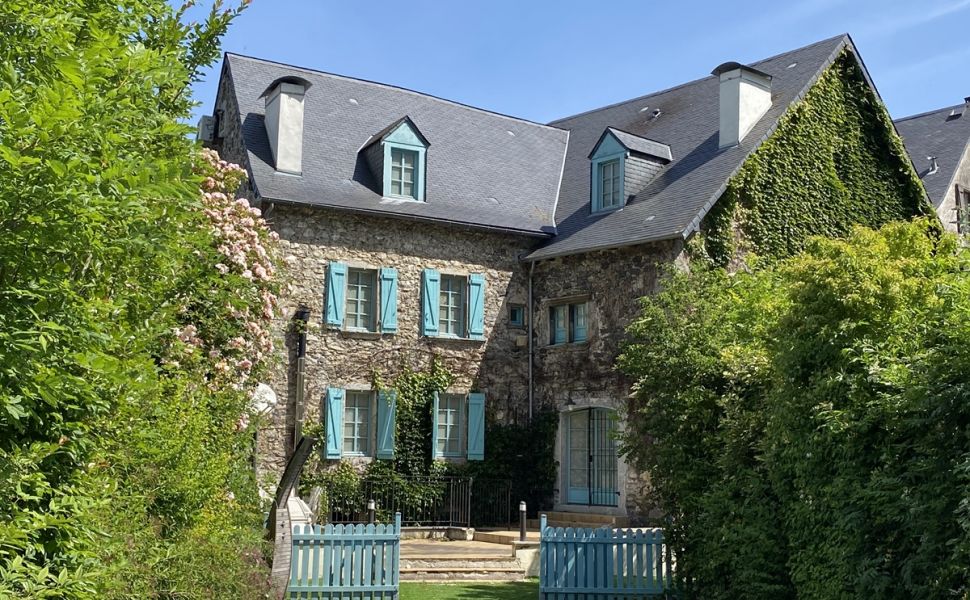 A Deceptively Large & Superbly Renovated Village Property
