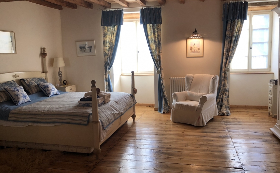 A Deceptively Large & Superbly Renovated Village Property