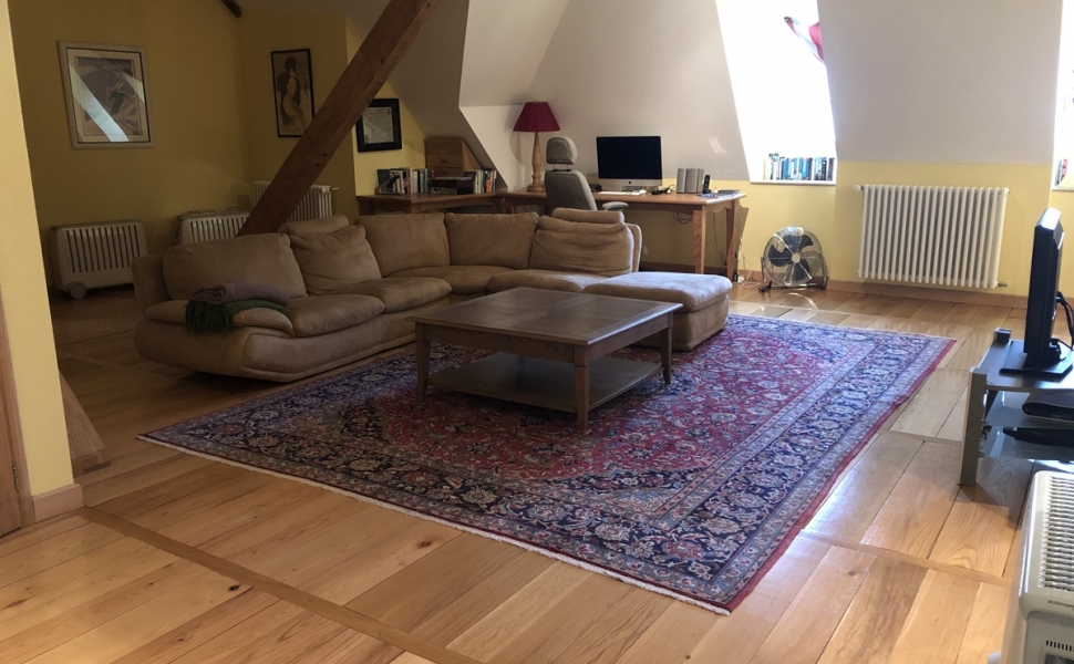 A Deceptively Large & Superbly Renovated Village Property