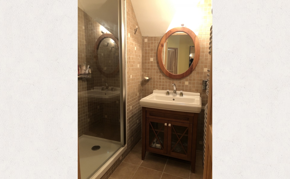 A Deceptively Large & Superbly Renovated Village Property