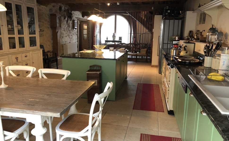 A Deceptively Large & Superbly Renovated Village Property