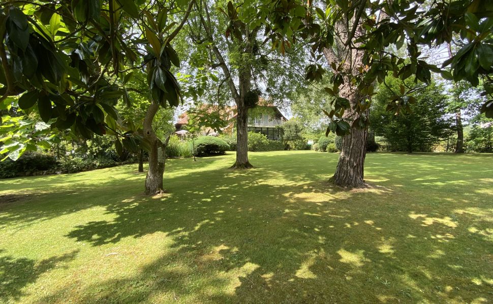 A Beautiful Contemporary Property with Charming Flowery Gardens in Heart of a Lovely Landaise Town