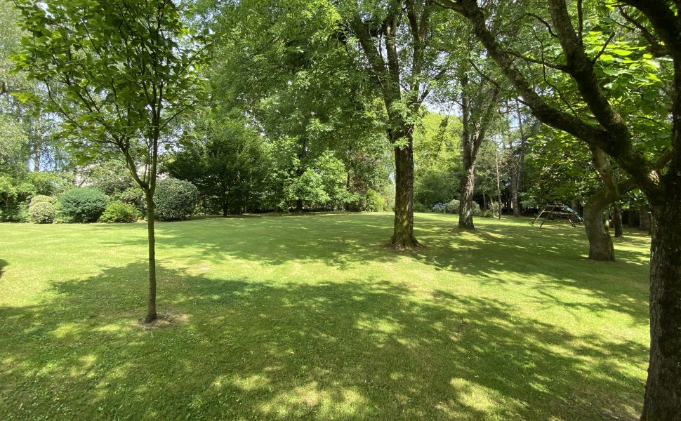 A Beautiful Contemporary Property with Charming Flowery Gardens in Heart of a Lovely Landaise Town