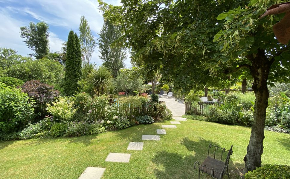 A Beautiful Contemporary Property with Charming Flowery Gardens in Heart of a Lovely Landaise Town