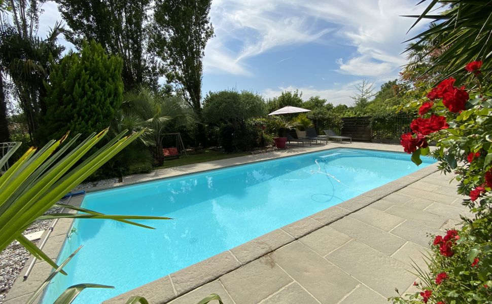 A Beautiful Contemporary Property with Charming Flowery Gardens in Heart of a Lovely Landaise Town