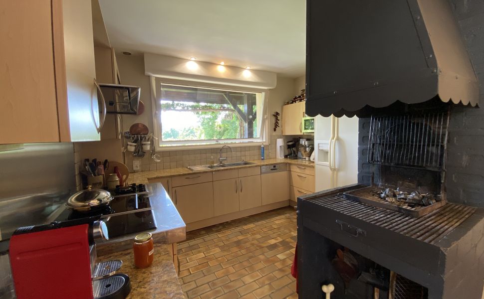 A Beautiful Contemporary Property with Charming Flowery Gardens in Heart of a Lovely Landaise Town