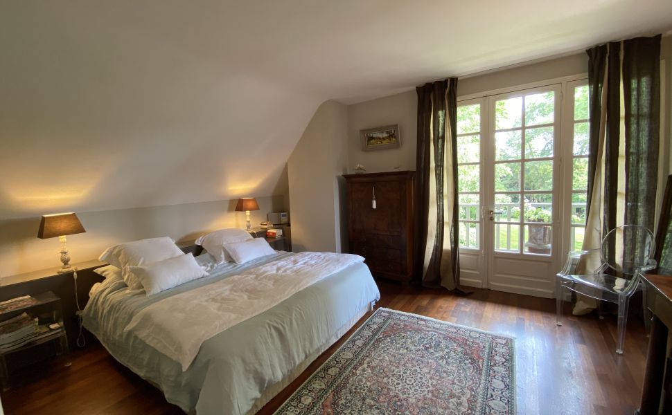 A Beautiful Contemporary Property with Charming Flowery Gardens in Heart of a Lovely Landaise Town