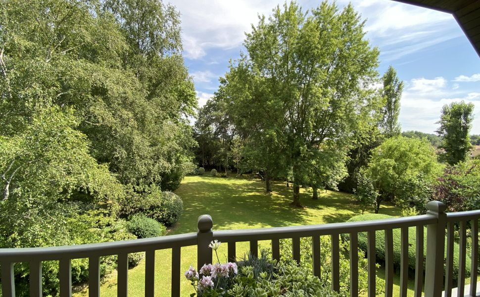 A Beautiful Contemporary Property with Charming Flowery Gardens in Heart of a Lovely Landaise Town