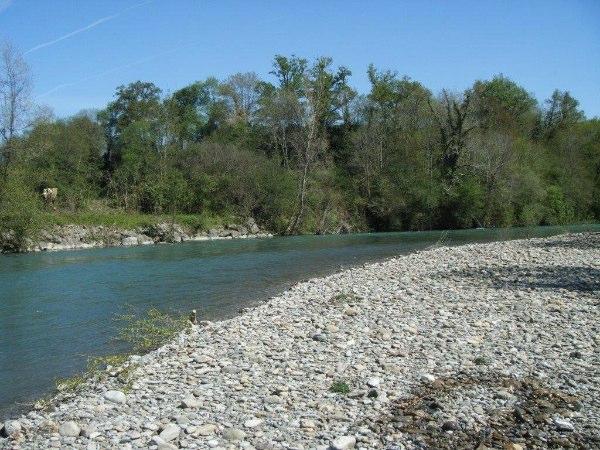 natural stone beach of the river saison
