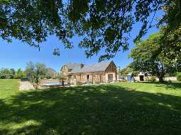 An Attractive Courtyard Farmhouse with Guest Cottage, Swimming Pool and Mountain Views