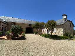 An Attractive Courtyard Farmhouse with Guest Cottage, Swimming Pool and Mountain Views