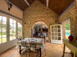 An Attractive Courtyard Farmhouse with Guest Cottage, Swimming Pool and Mountain Views