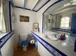 An Attractive Courtyard Farmhouse with Guest Cottage, Swimming Pool and Mountain Views