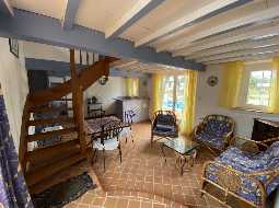 An Attractive Courtyard Farmhouse with Guest Cottage, Swimming Pool and Mountain Views