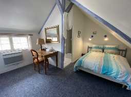 An Attractive Courtyard Farmhouse with Guest Cottage, Swimming Pool and Mountain Views