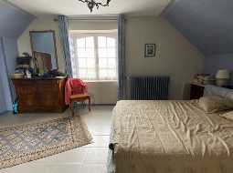 An Attractive Courtyard Farmhouse with Guest Cottage, Swimming Pool and Mountain Views