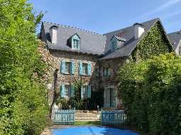 A Deceptively Large & Superbly Renovated Village Property
