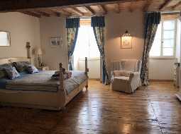 A Deceptively Large & Superbly Renovated Village Property
