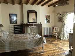A Deceptively Large & Superbly Renovated Village Property