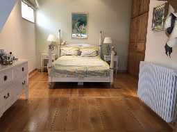 A Deceptively Large & Superbly Renovated Village Property