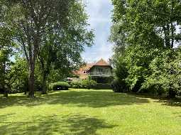 A Beautiful Contemporary Property with Charming Flowery Gardens in Heart of a Lovely Landaise Town