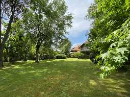A Beautiful Contemporary Property with Charming Flowery Gardens in Heart of a Lovely Landaise Town