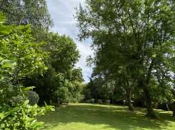 A Beautiful Contemporary Property with Charming Flowery Gardens in Heart of a Lovely Landaise Town