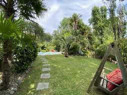 A Beautiful Contemporary Property with Charming Flowery Gardens in Heart of a Lovely Landaise Town