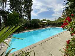 A Beautiful Contemporary Property with Charming Flowery Gardens in Heart of a Lovely Landaise Town