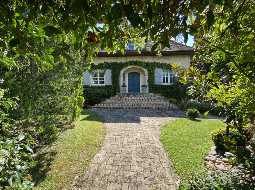 A Beautiful Contemporary Property with Charming Flowery Gardens in Heart of a Lovely Landaise Town