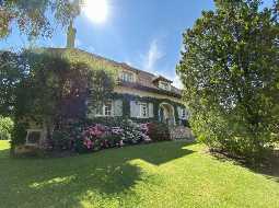 A Beautiful Contemporary Property with Charming Flowery Gardens in Heart of a Lovely Landaise Town