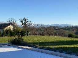 A Charming Béarnaise Farmhouse with Three Vast Barns & Views of the Pyrenees Mountains