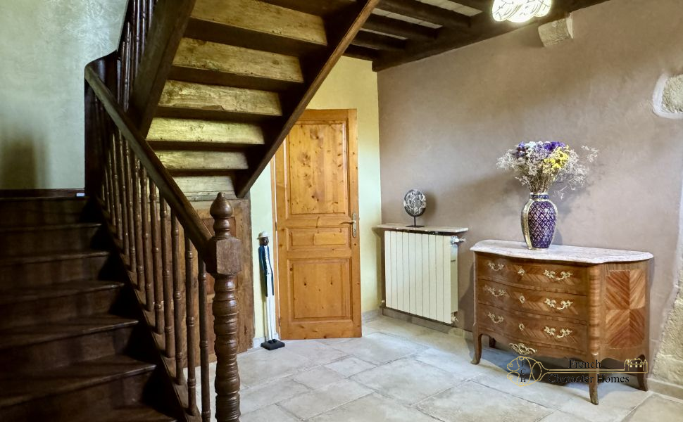 Charming Béarnaise Farmstead with Renovated Home, Barns & Gîte Potential 
