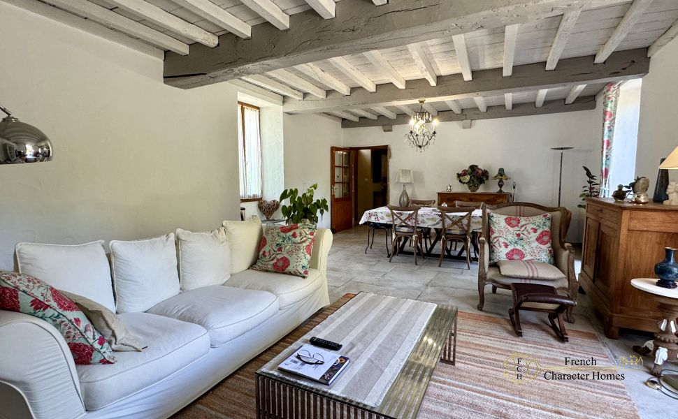 Charming Béarnaise Farmstead with Renovated Home, Barns & Gîte Potential 