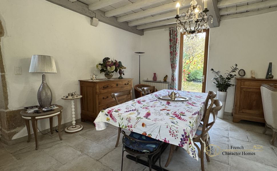 Charming Béarnaise Farmstead with Renovated Home, Barns & Gîte Potential 