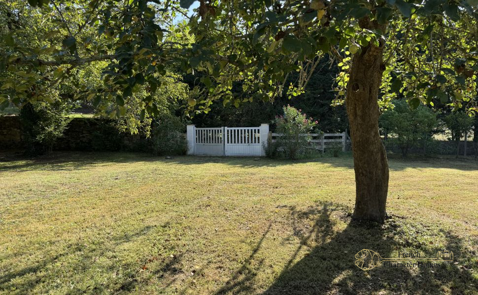 Charming Béarnaise Farmstead with Renovated Home, Barns & Gîte Potential 
