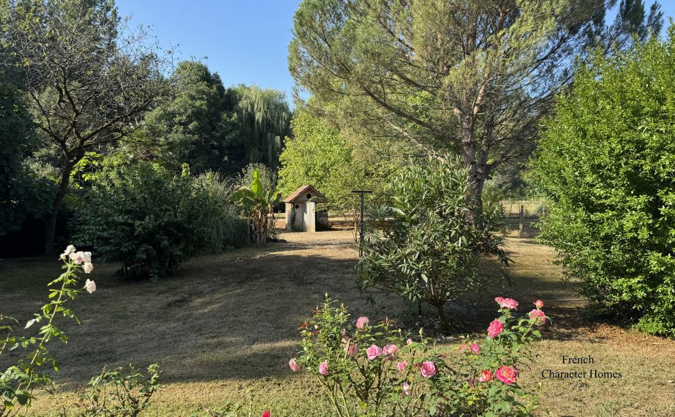 Charming Béarnaise Farmstead with Renovated Home, Barns & Gîte Potential 