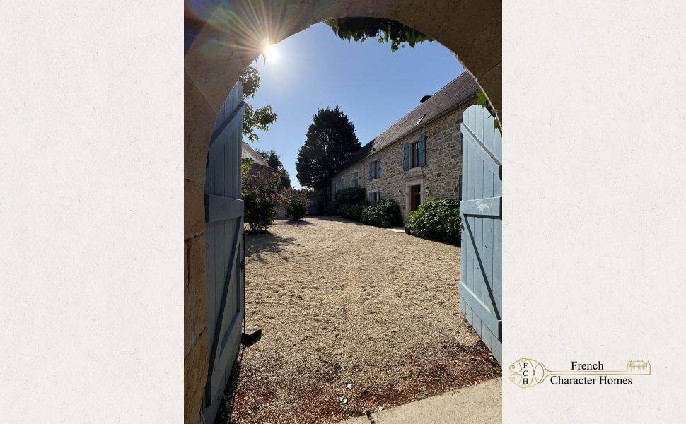 Charming Béarnaise Farmstead with Renovated Home, Barns & Gîte Potential 