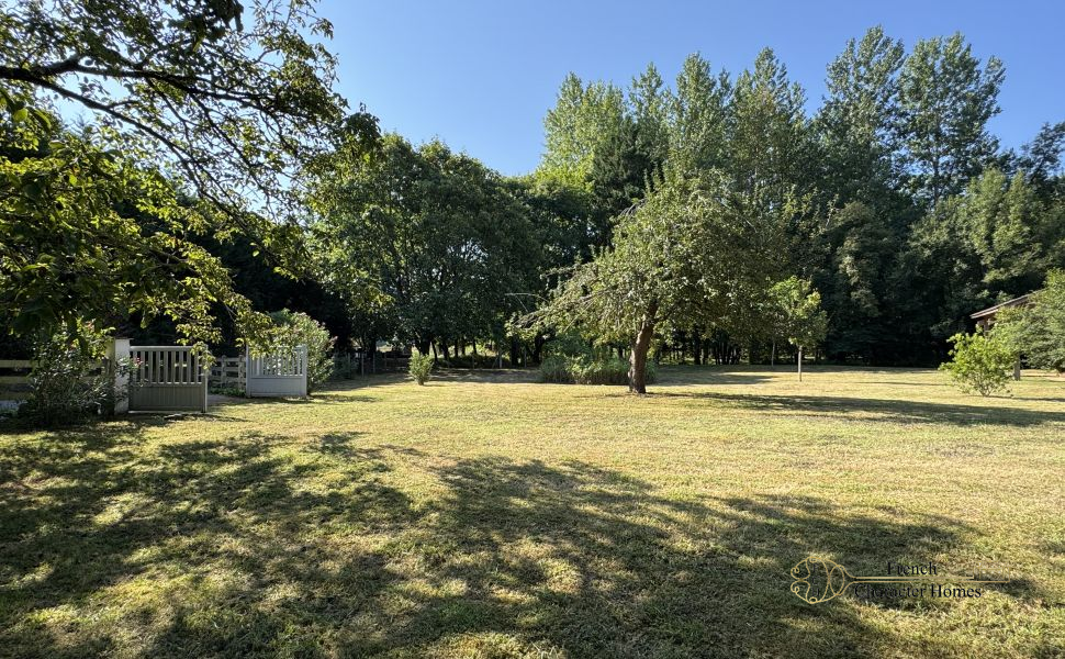 Charming Béarnaise Farmstead with Renovated Home, Barns & Gîte Potential 
