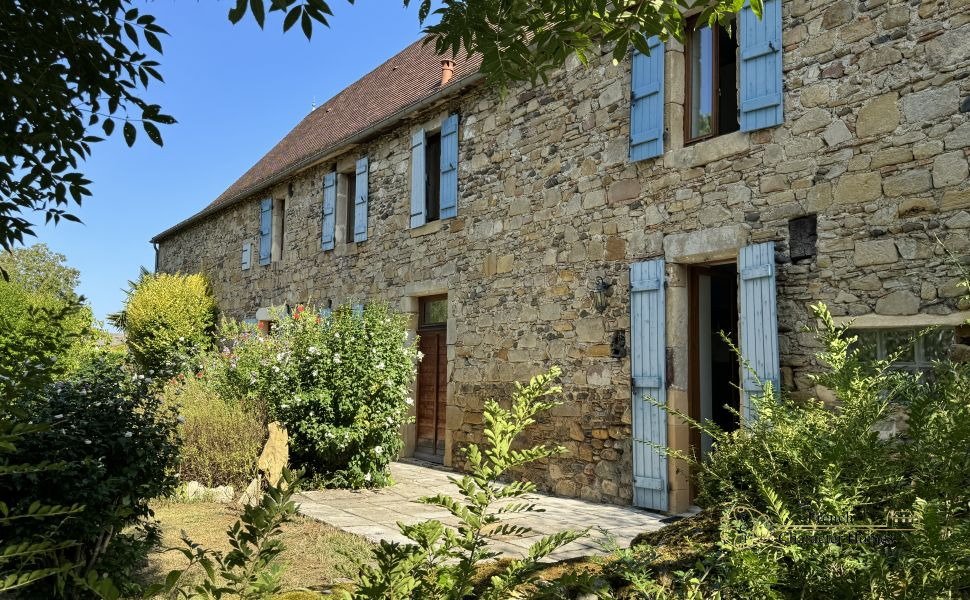 Charming Béarnaise Farmstead with Renovated Home, Barns & Gîte Potential 